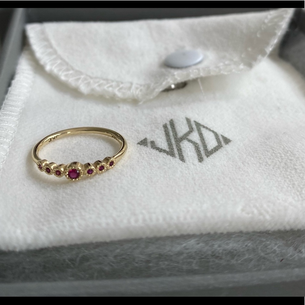 14k gold custom ring with ruby stones
